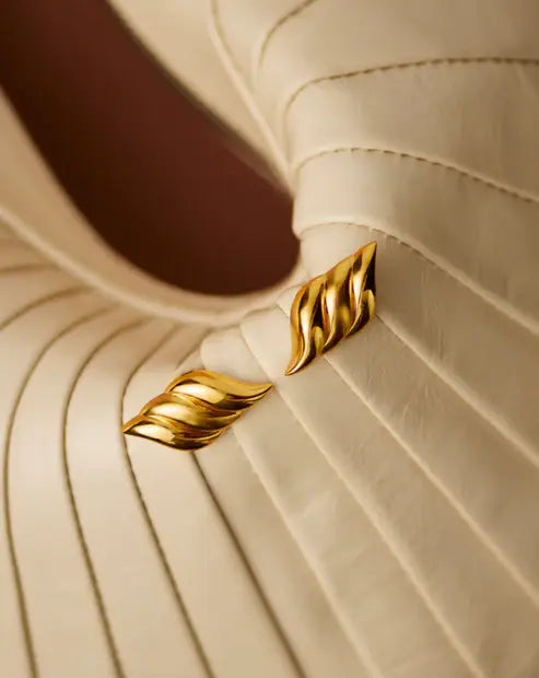 Opvallende oversized gouden oorknopjes